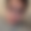 M.