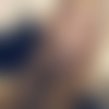 J.